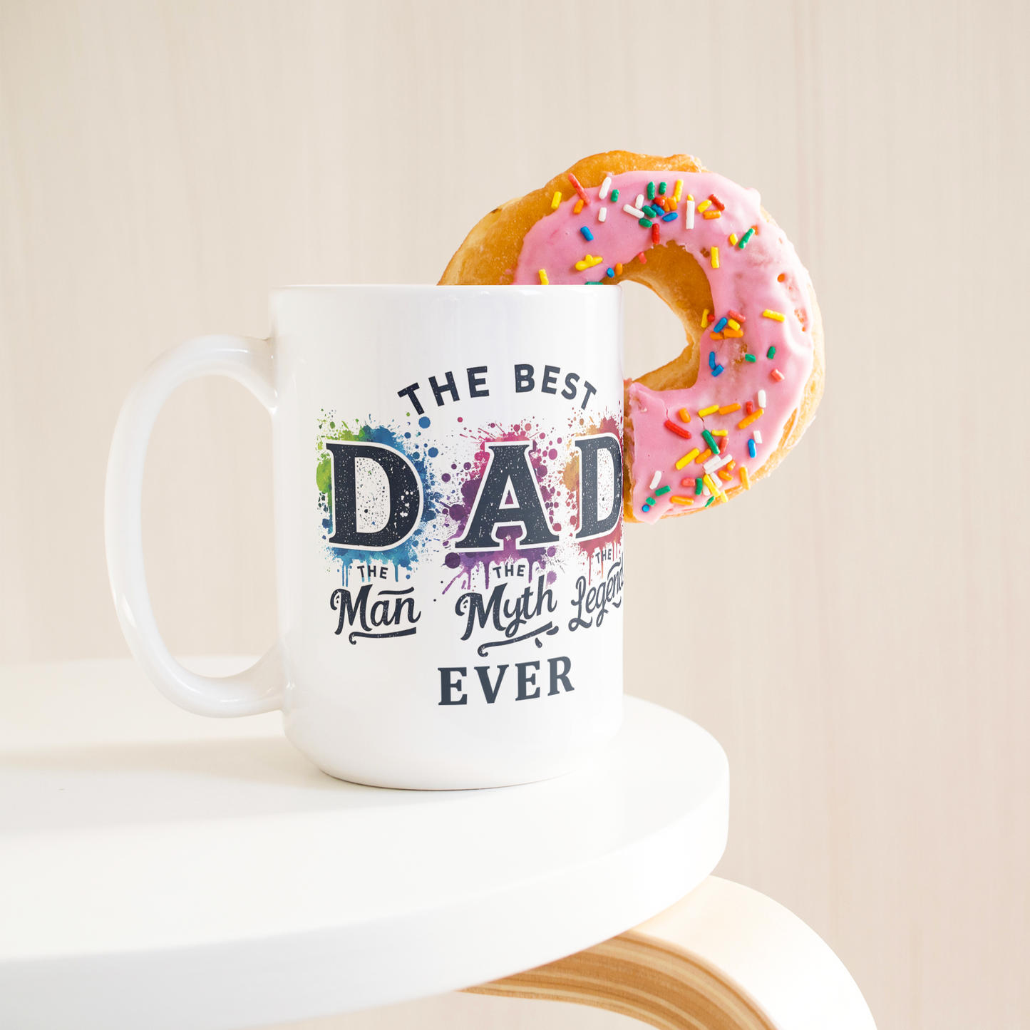 Best_DAD_Ever_Man_Myth_Legend_-_MUG_15ozWhiteMugLifetsyleDonutLH_Mockup.png