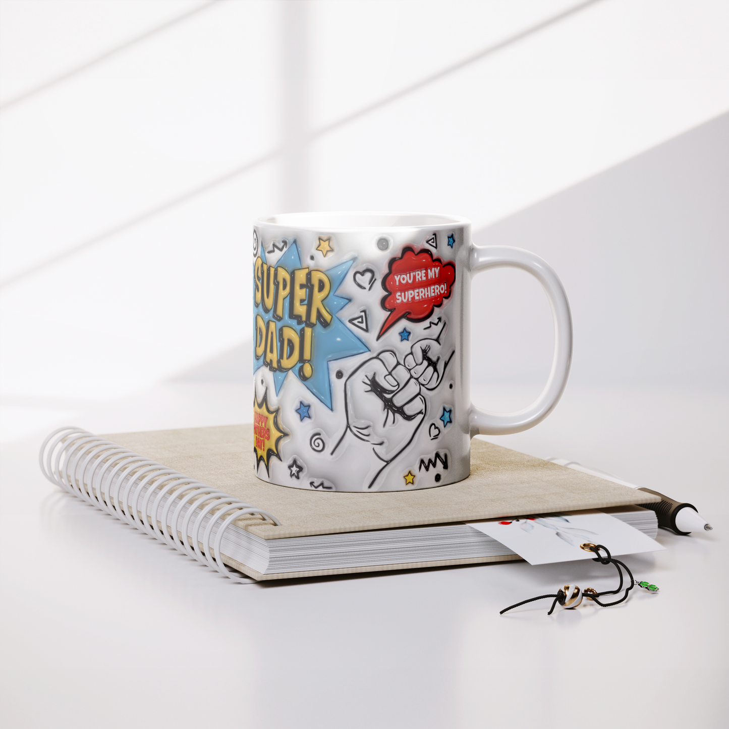 Fathers_Day_SUPER_DAD_Mug_Simulated_3D__Lifestyle_Notebook_Mockup.png