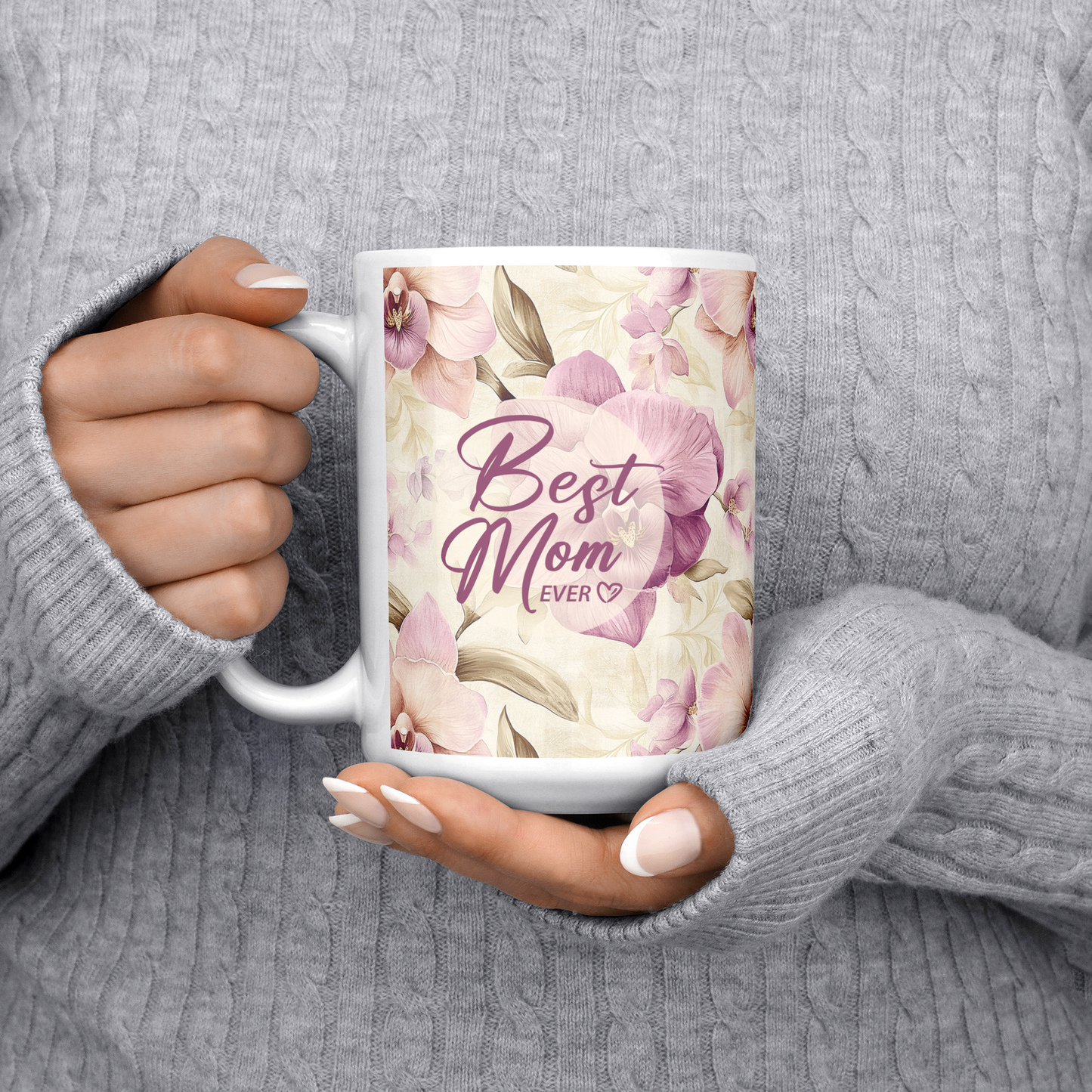 Best_Mom_Ever_Flowers_-_Mug_15ozWhiteMugLifestyleLHChest_Mockup.png