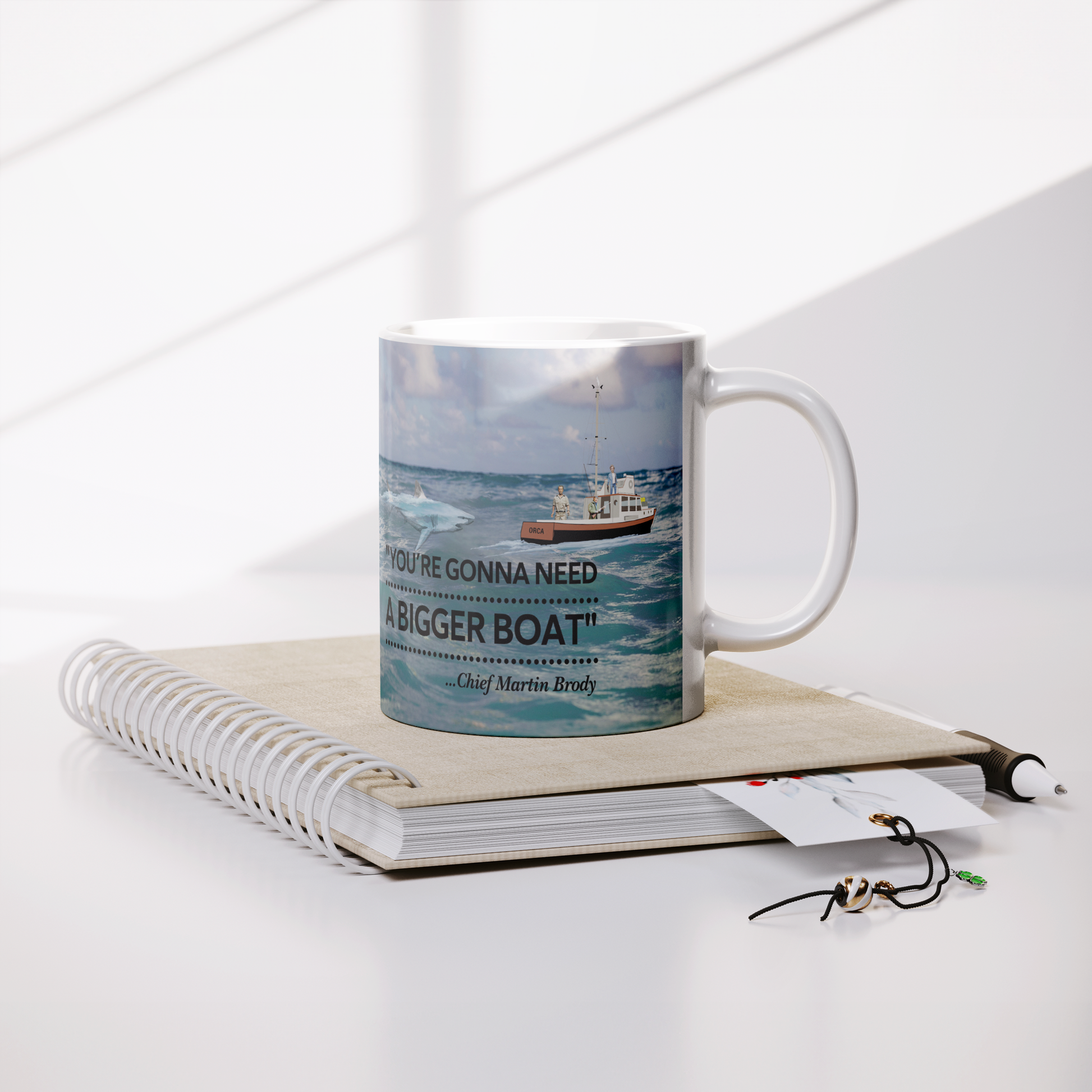 Jaws_-_Need_A_Bigger_Boat_Scene_Mug_Lifestyle_Notebook_Mockup.png